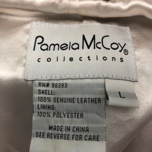 White leather jacket.